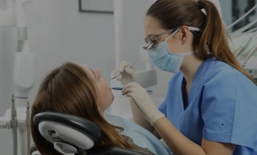 Dental patient getting dental treatment from orthodontist